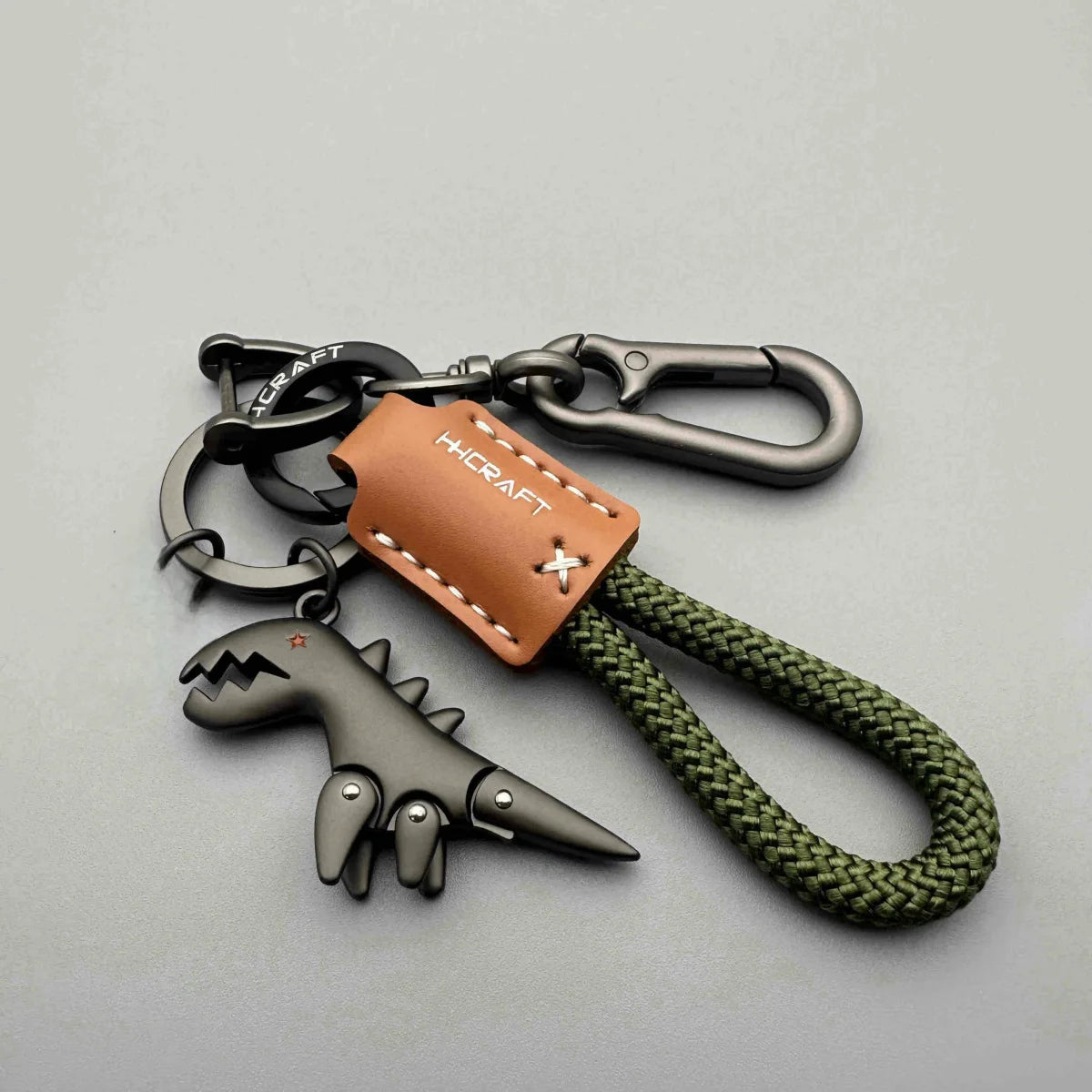 Premium Woven Leather Metal Dinosaur Keychain for Motorcycle Car Handbag Backpack Pendant Gift Accessories with Bracelet