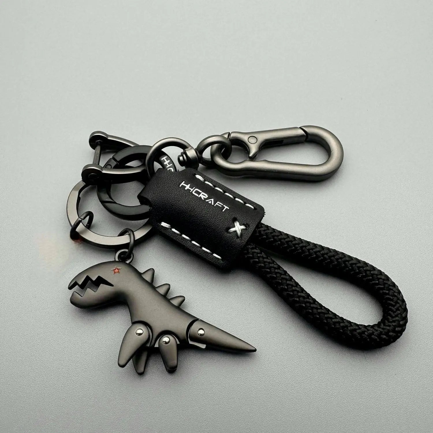 Premium Woven Leather Metal Dinosaur Keychain for Motorcycle Car Handbag Backpack Pendant Gift Accessories with Bracelet