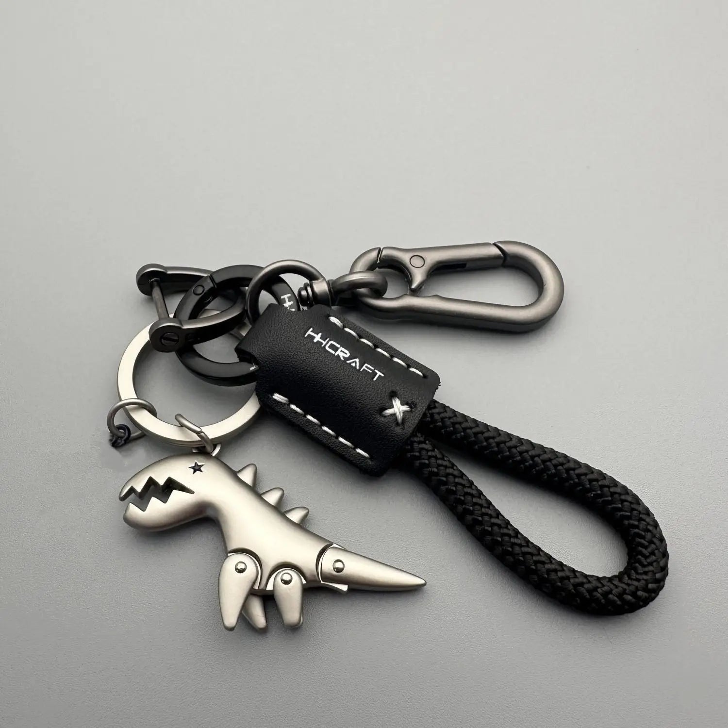 Premium Woven Leather Metal Dinosaur Keychain for Motorcycle Car Handbag Backpack Pendant Gift Accessories with Bracelet